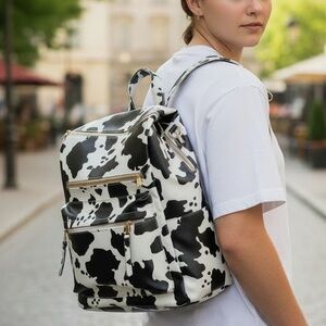 Cute Cow Print Backpack Pleather material. Great condition!